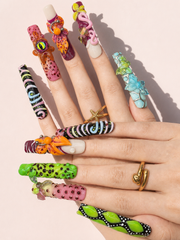 Mutant Habitat long square press-on nails worn on hand