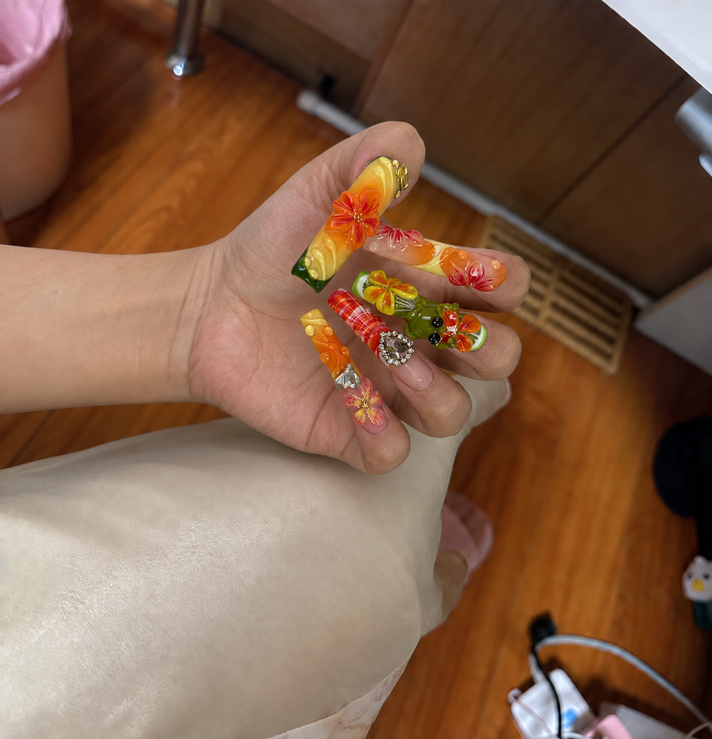 Customer wearing press-on nails