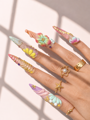 Pastel Current stiletto press-on nails worn on hand