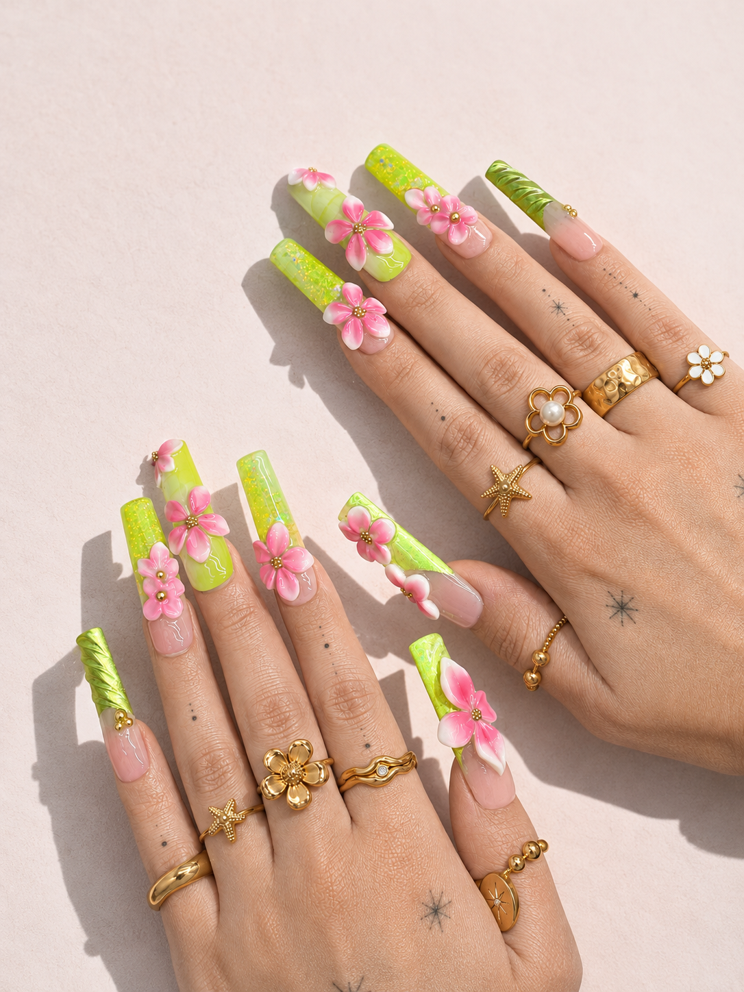 Pink Canopy long square press-on nails worn on hand