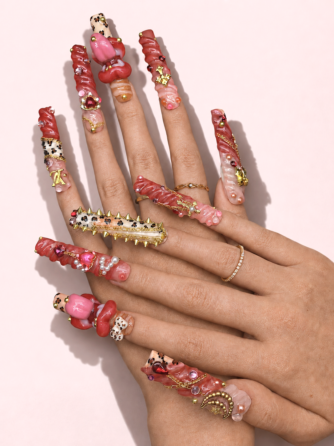 Scarlet Riot long square press-on nails worn on hand