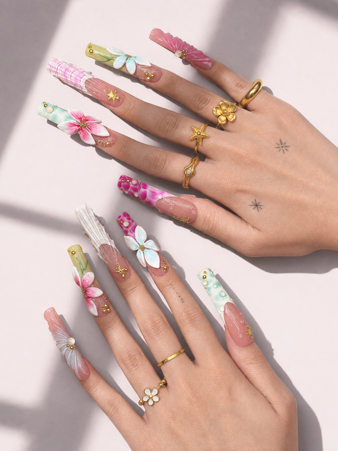 Seaside Bloom long square press-on nails worn on hand
