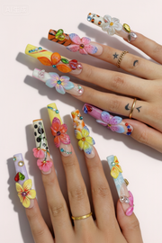 Prism Petals long square press-on nails worn on hand